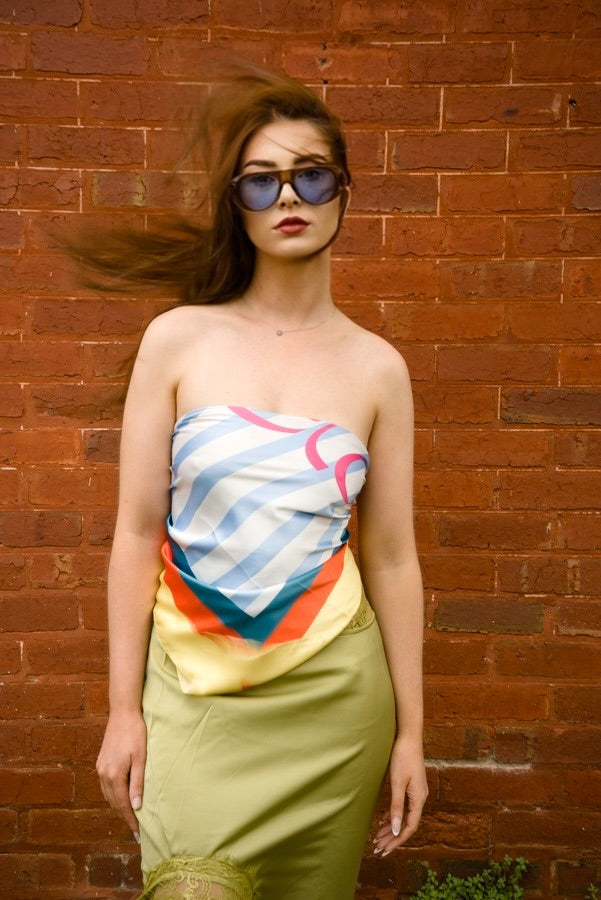 EVELO Sunset Overture colour block scarf in yellow, teal, blue, red.