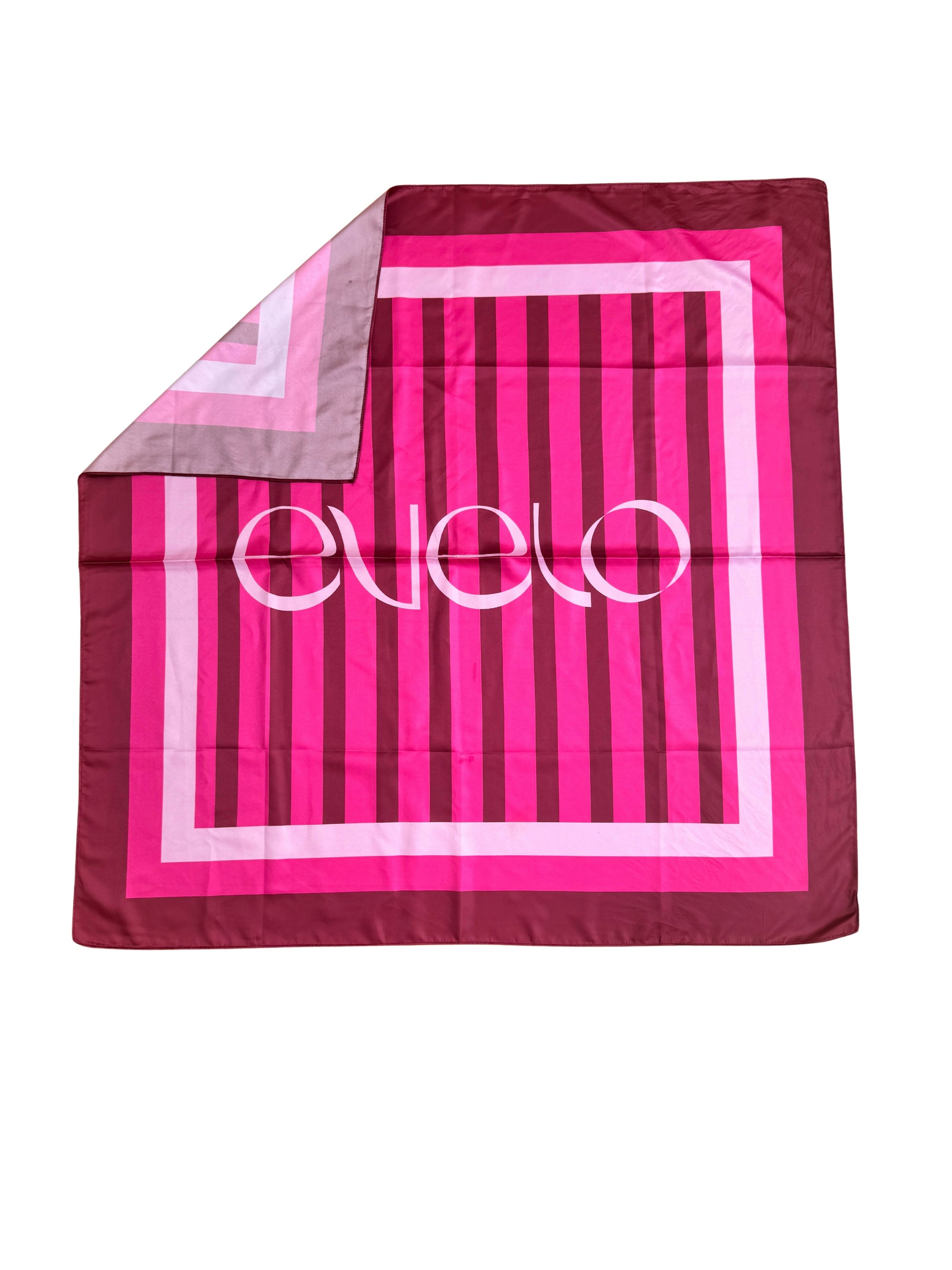 Pink Cadence scarf tied around neck – EVELO accessories