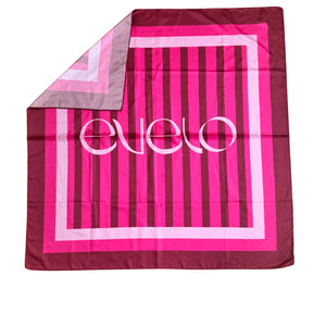 Pink Cadence scarf tied around neck – EVELO accessories